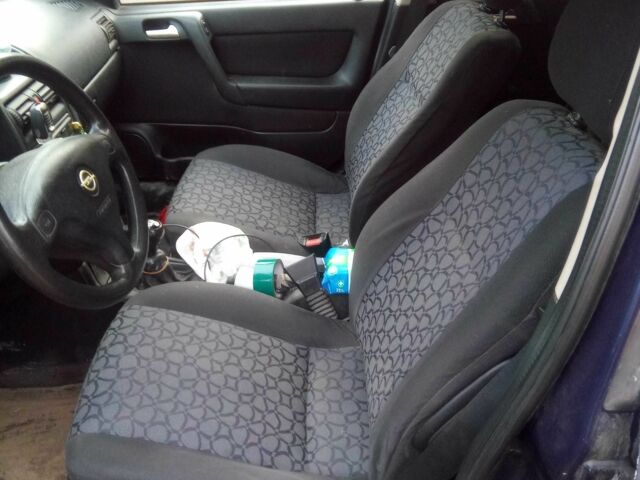 Синий Опель Астра, объемом двигателя 1.6 л и пробегом 410 тыс. км за 2299 $, фото 4 на Automoto.ua