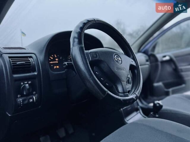 Синий Опель Астра, объемом двигателя 1.7 л и пробегом 270 тыс. км за 2799 $, фото 14 на Automoto.ua