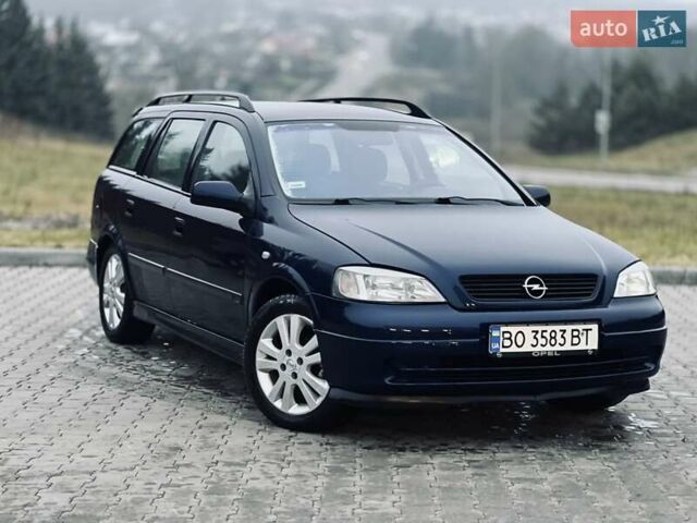 Синий Опель Астра, объемом двигателя 1.7 л и пробегом 270 тыс. км за 2799 $, фото 3 на Automoto.ua