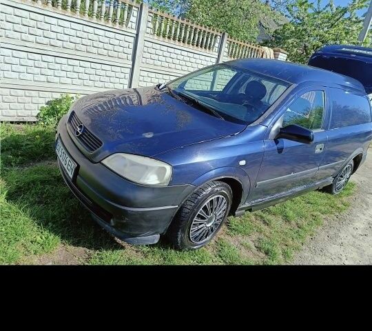 Синий Опель Астра, объемом двигателя 2 л и пробегом 250 тыс. км за 1100 $, фото 5 на Automoto.ua