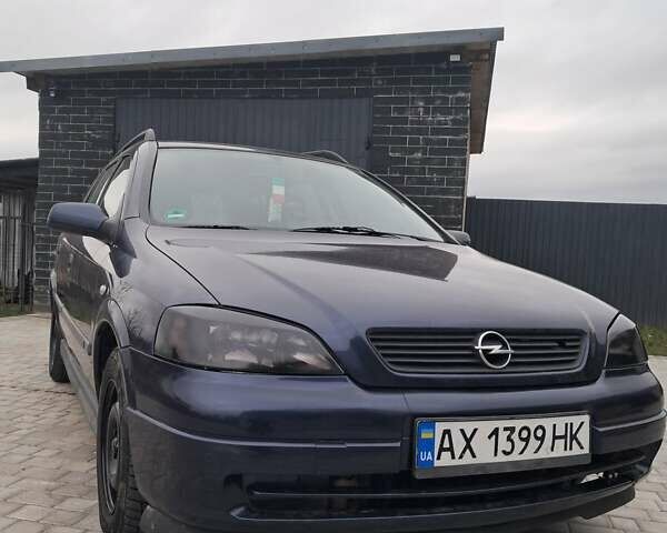 Синий Опель Астра, объемом двигателя 1.6 л и пробегом 330 тыс. км за 1950 $, фото 3 на Automoto.ua