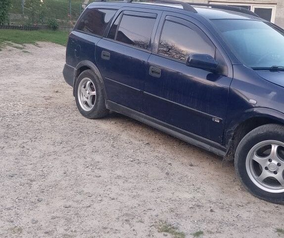 Синий Опель Астра, объемом двигателя 1.7 л и пробегом 447 тыс. км за 2300 $, фото 2 на Automoto.ua