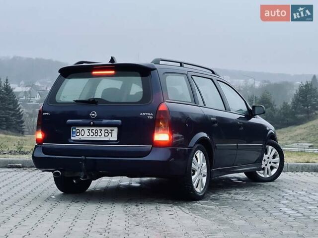 Синий Опель Астра, объемом двигателя 1.7 л и пробегом 270 тыс. км за 2799 $, фото 12 на Automoto.ua
