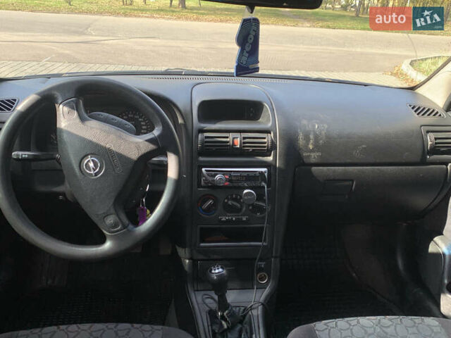 Синий Опель Астра, объемом двигателя 2 л и пробегом 359 тыс. км за 3000 $, фото 8 на Automoto.ua