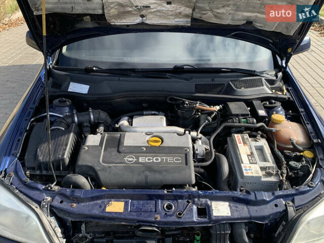 Синий Опель Астра, объемом двигателя 2 л и пробегом 359 тыс. км за 3000 $, фото 6 на Automoto.ua