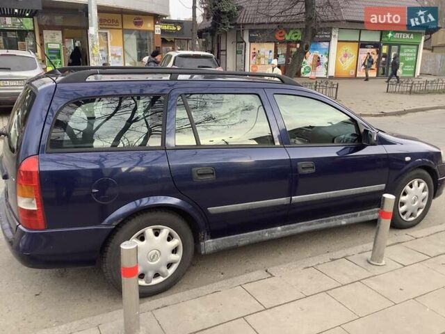 Синий Опель Астра, объемом двигателя 2 л и пробегом 225 тыс. км за 3000 $, фото 5 на Automoto.ua