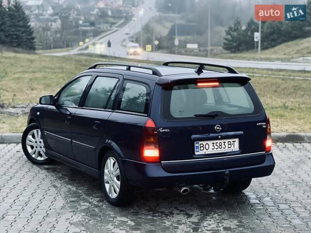 Синий Опель Астра, объемом двигателя 1.7 л и пробегом 270 тыс. км за 2799 $, фото 9 на Automoto.ua