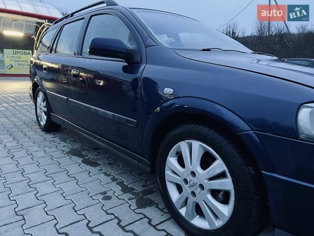 Синий Опель Астра, объемом двигателя 1.7 л и пробегом 270 тыс. км за 2799 $, фото 29 на Automoto.ua