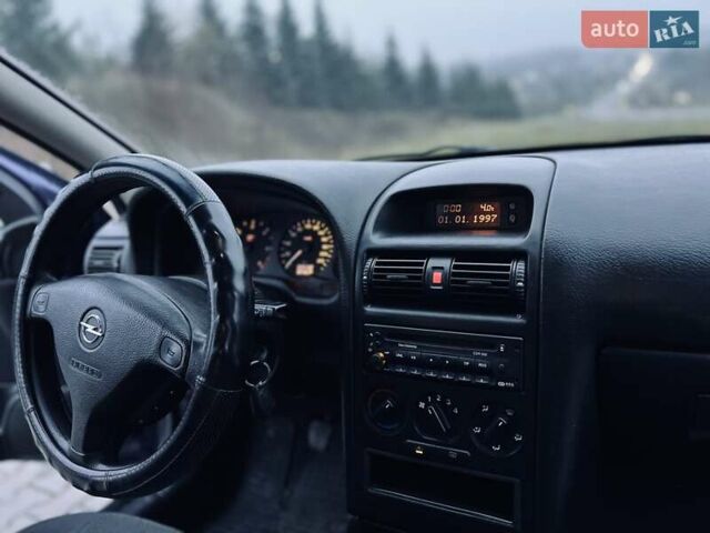 Синий Опель Астра, объемом двигателя 1.7 л и пробегом 270 тыс. км за 2799 $, фото 17 на Automoto.ua