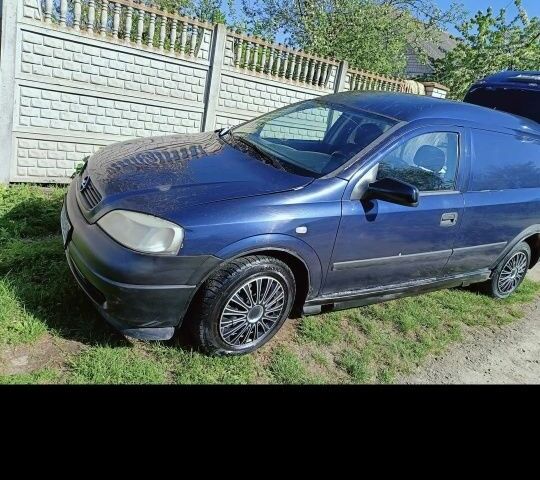 Синий Опель Астра, объемом двигателя 2 л и пробегом 250 тыс. км за 1100 $, фото 3 на Automoto.ua