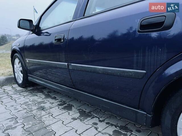 Синий Опель Астра, объемом двигателя 1.7 л и пробегом 270 тыс. км за 2799 $, фото 26 на Automoto.ua