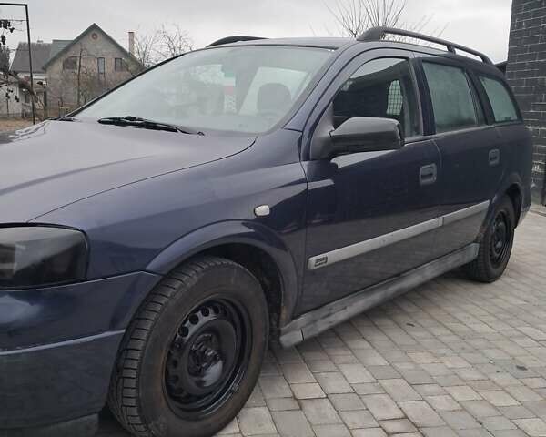 Синий Опель Астра, объемом двигателя 1.6 л и пробегом 330 тыс. км за 1950 $, фото 4 на Automoto.ua