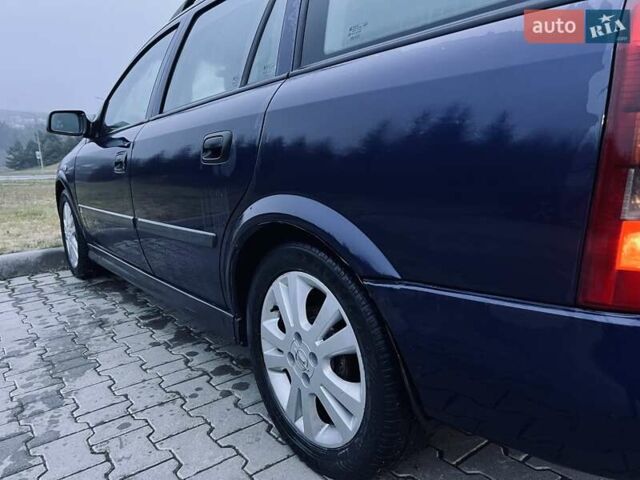 Синий Опель Астра, объемом двигателя 1.7 л и пробегом 270 тыс. км за 2799 $, фото 27 на Automoto.ua