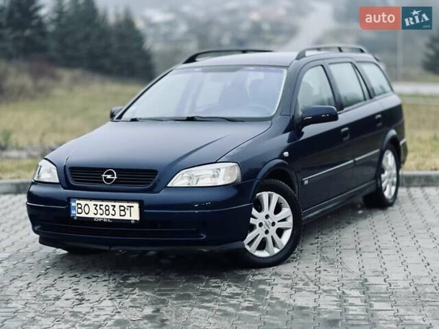 Синий Опель Астра, объемом двигателя 1.7 л и пробегом 270 тыс. км за 2799 $, фото 4 на Automoto.ua