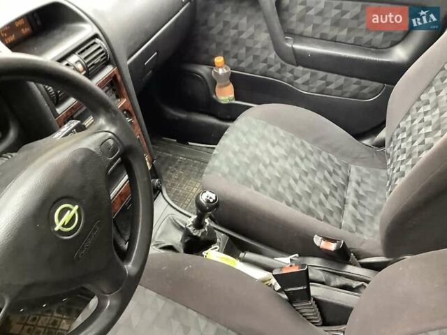 Синий Опель Астра, объемом двигателя 2 л и пробегом 225 тыс. км за 3000 $, фото 9 на Automoto.ua