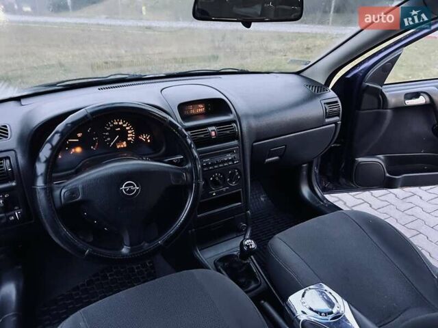Синий Опель Астра, объемом двигателя 1.7 л и пробегом 270 тыс. км за 2799 $, фото 21 на Automoto.ua