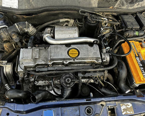 Синий Опель Астра, объемом двигателя 2 л и пробегом 300 тыс. км за 1650 $, фото 4 на Automoto.ua