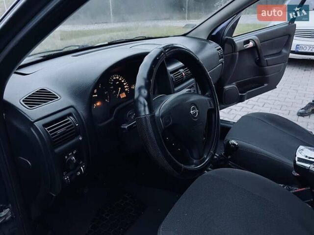 Синий Опель Астра, объемом двигателя 1.7 л и пробегом 270 тыс. км за 2799 $, фото 18 на Automoto.ua