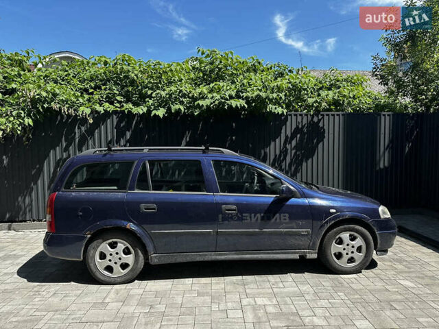 Синий Опель Астра, объемом двигателя 2 л и пробегом 450 тыс. км за 2200 $, фото 1 на Automoto.ua
