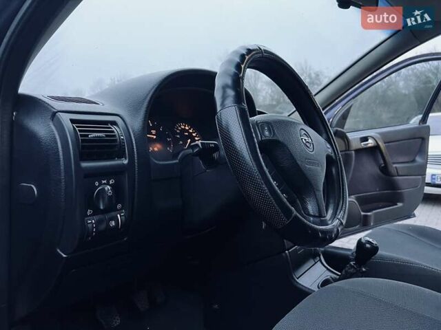 Синий Опель Астра, объемом двигателя 1.7 л и пробегом 270 тыс. км за 2799 $, фото 19 на Automoto.ua