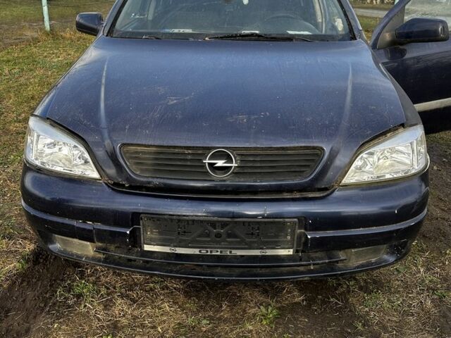 Синий Опель Астра, объемом двигателя 2 л и пробегом 300 тыс. км за 1650 $, фото 1 на Automoto.ua