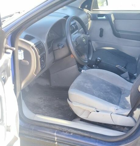 Синій Опель Астра, об'ємом двигуна 2 л та пробігом 292 тис. км за 2501 $, фото 6 на Automoto.ua