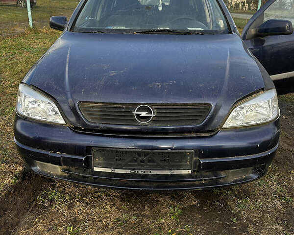 Синий Опель Астра, объемом двигателя 2 л и пробегом 300 тыс. км за 1650 $, фото 3 на Automoto.ua