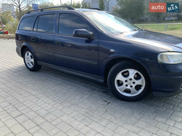 Синий Опель Астра, объемом двигателя 2 л и пробегом 359 тыс. км за 3000 $, фото 4 на Automoto.ua