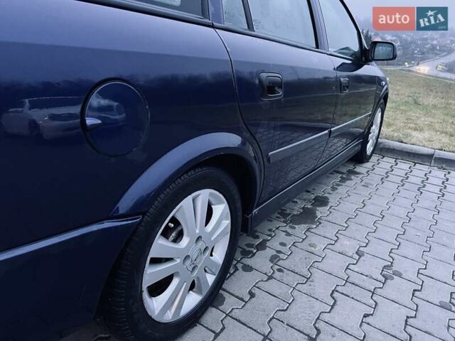 Синий Опель Астра, объемом двигателя 1.7 л и пробегом 270 тыс. км за 2799 $, фото 28 на Automoto.ua