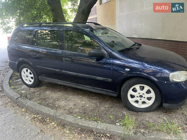 Синий Опель Астра, объемом двигателя 2 л и пробегом 300 тыс. км за 2500 $, фото 6 на Automoto.ua