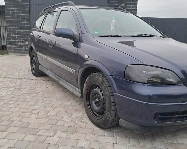 Синий Опель Астра, объемом двигателя 1.6 л и пробегом 330 тыс. км за 1950 $, фото 1 на Automoto.ua