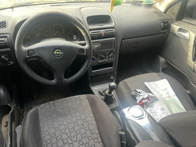 Синий Опель Астра, объемом двигателя 2 л и пробегом 260 тыс. км за 850 $, фото 4 на Automoto.ua