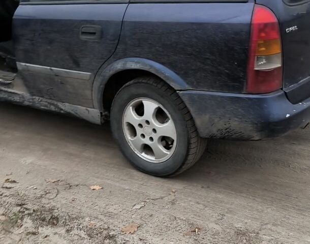 Синий Опель Астра, объемом двигателя 2 л и пробегом 300 тыс. км за 870 $, фото 6 на Automoto.ua