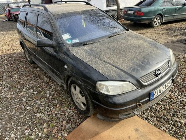 Синий Опель Астра, объемом двигателя 2 л и пробегом 260 тыс. км за 850 $, фото 1 на Automoto.ua