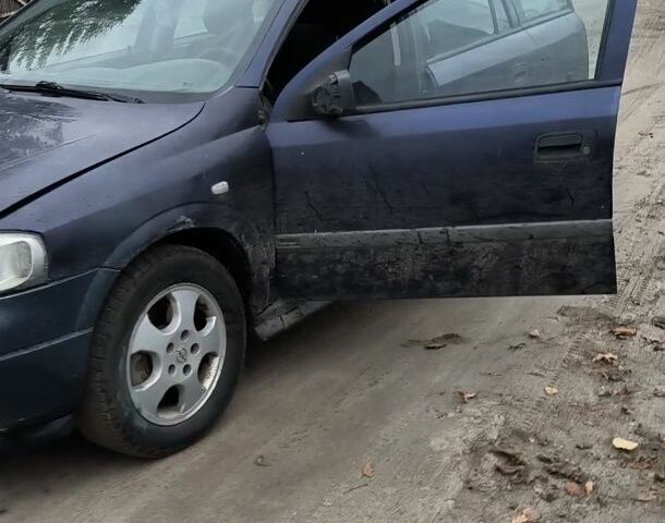 Синий Опель Астра, объемом двигателя 2 л и пробегом 300 тыс. км за 870 $, фото 1 на Automoto.ua