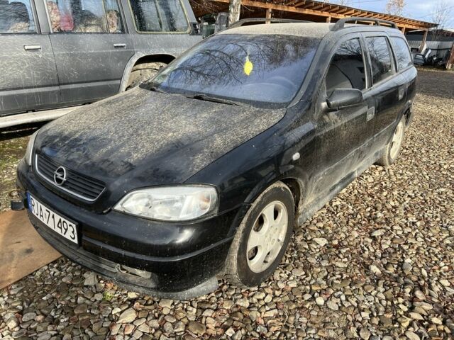 Синий Опель Астра, объемом двигателя 2 л и пробегом 260 тыс. км за 850 $, фото 2 на Automoto.ua