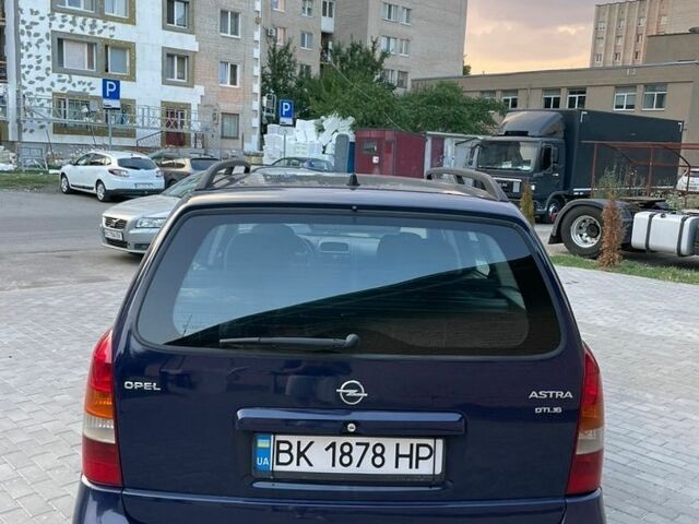 Синій Опель Астра, об'ємом двигуна 2 л та пробігом 304 тис. км за 1950 $, фото 5 на Automoto.ua