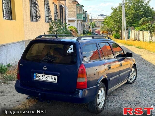 Синий Опель Астра, объемом двигателя 1.7 л и пробегом 300 тыс. км за 1549 $, фото 2 на Automoto.ua