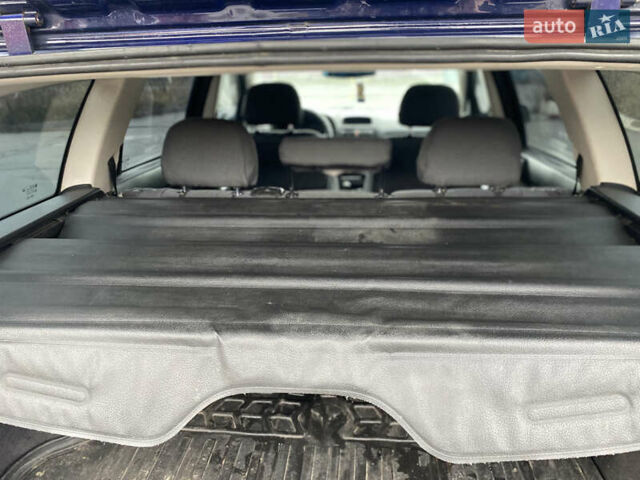 Синий Опель Астра, объемом двигателя 1.69 л и пробегом 353 тыс. км за 3500 $, фото 6 на Automoto.ua