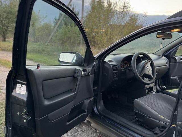 Синий Опель Астра, объемом двигателя 2 л и пробегом 250 тыс. км за 2350 $, фото 10 на Automoto.ua