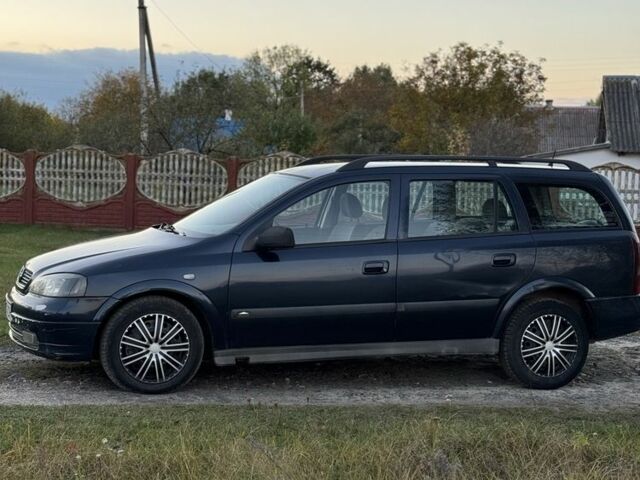 Синий Опель Астра, объемом двигателя 2 л и пробегом 250 тыс. км за 2350 $, фото 7 на Automoto.ua