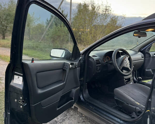 Синий Опель Астра, объемом двигателя 2 л и пробегом 250 тыс. км за 2350 $, фото 12 на Automoto.ua