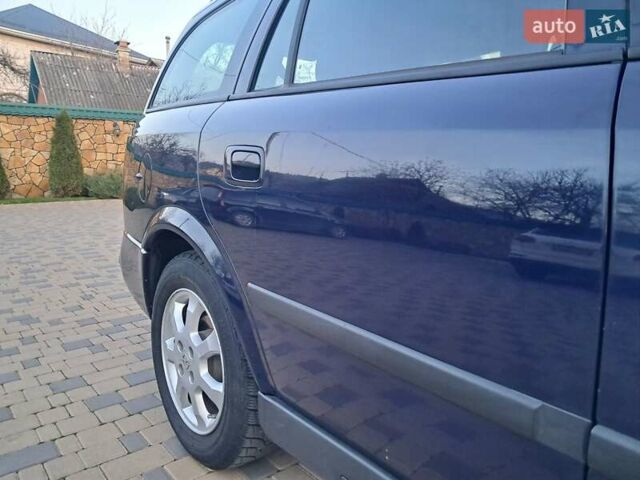 Синій Опель Астра, об'ємом двигуна 1.6 л та пробігом 233 тис. км за 3450 $, фото 32 на Automoto.ua