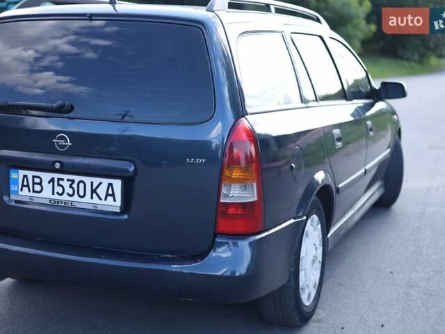 Синий Опель Астра, объемом двигателя 1.69 л и пробегом 270 тыс. км за 4200 $, фото 2 на Automoto.ua