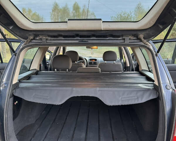 Синий Опель Астра, объемом двигателя 2 л и пробегом 250 тыс. км за 2350 $, фото 19 на Automoto.ua