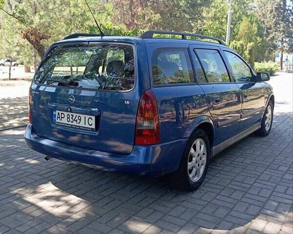 Синий Опель Астра, объемом двигателя 1.6 л и пробегом 233 тыс. км за 4300 $, фото 5 на Automoto.ua