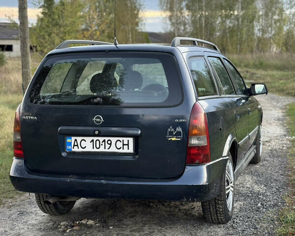 Синий Опель Астра, объемом двигателя 2 л и пробегом 250 тыс. км за 2350 $, фото 5 на Automoto.ua