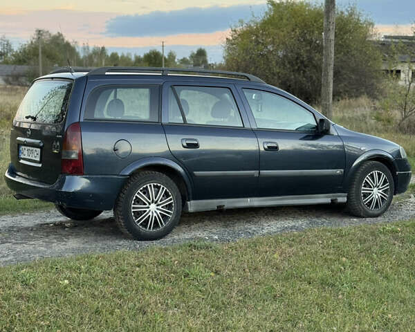 Синий Опель Астра, объемом двигателя 2 л и пробегом 250 тыс. км за 2350 $, фото 3 на Automoto.ua