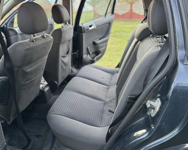 Синий Опель Астра, объемом двигателя 2 л и пробегом 250 тыс. км за 2350 $, фото 18 на Automoto.ua