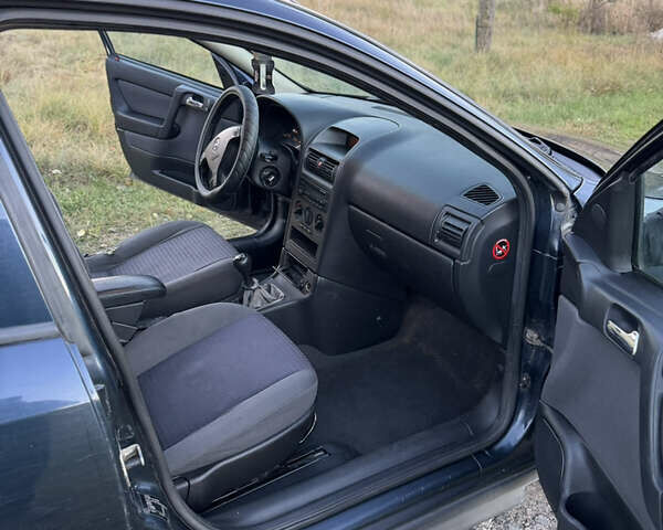 Синий Опель Астра, объемом двигателя 2 л и пробегом 250 тыс. км за 2350 $, фото 15 на Automoto.ua